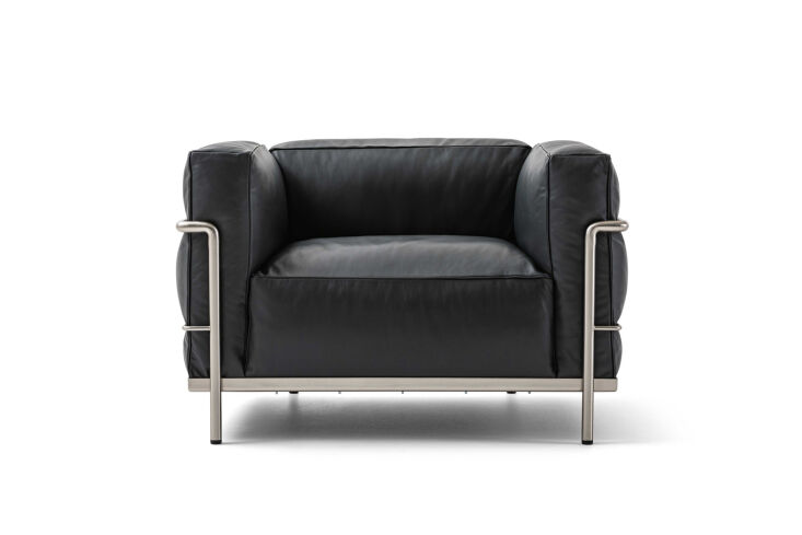 The LC3 Grand Modele Armchair with a black leather cushion and visible external tubular chrome frame.
