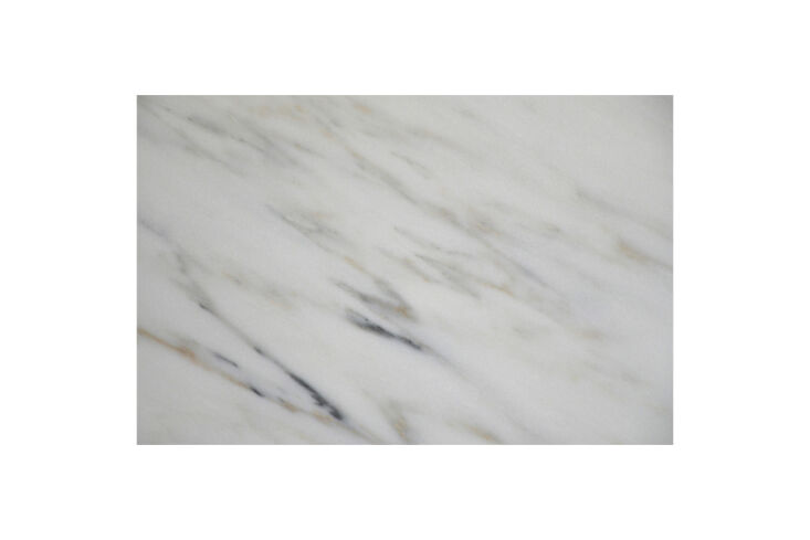 Close-up of Imperial Danby Marble countertops with light grey veining.