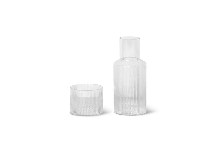 The Ferm Living Ripple Carafe Set featuring a vertical ribbed glass texture.