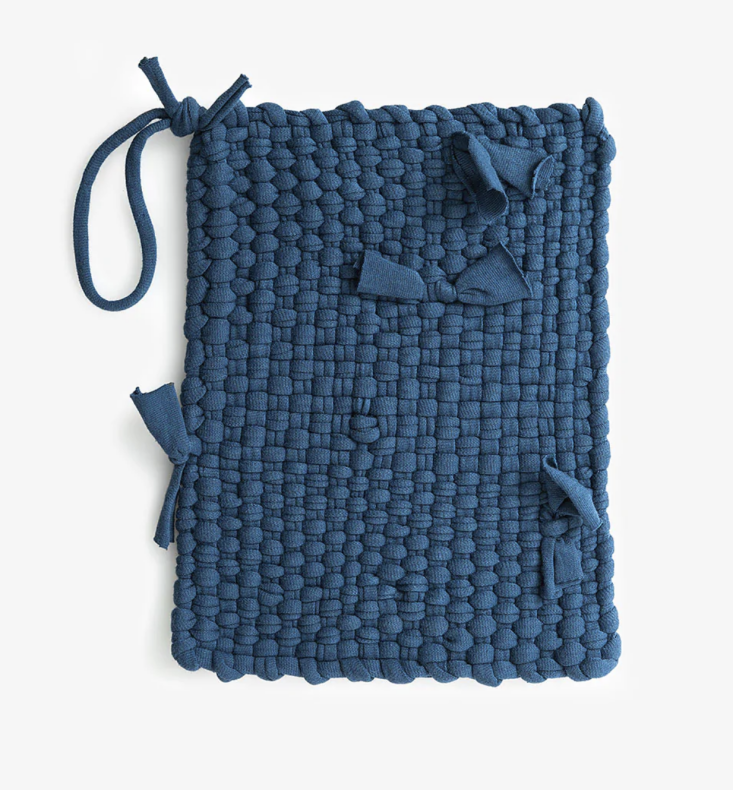 A thick, organic cotton hand-loomed potholder by Alabama Chanin in a neutral tone.