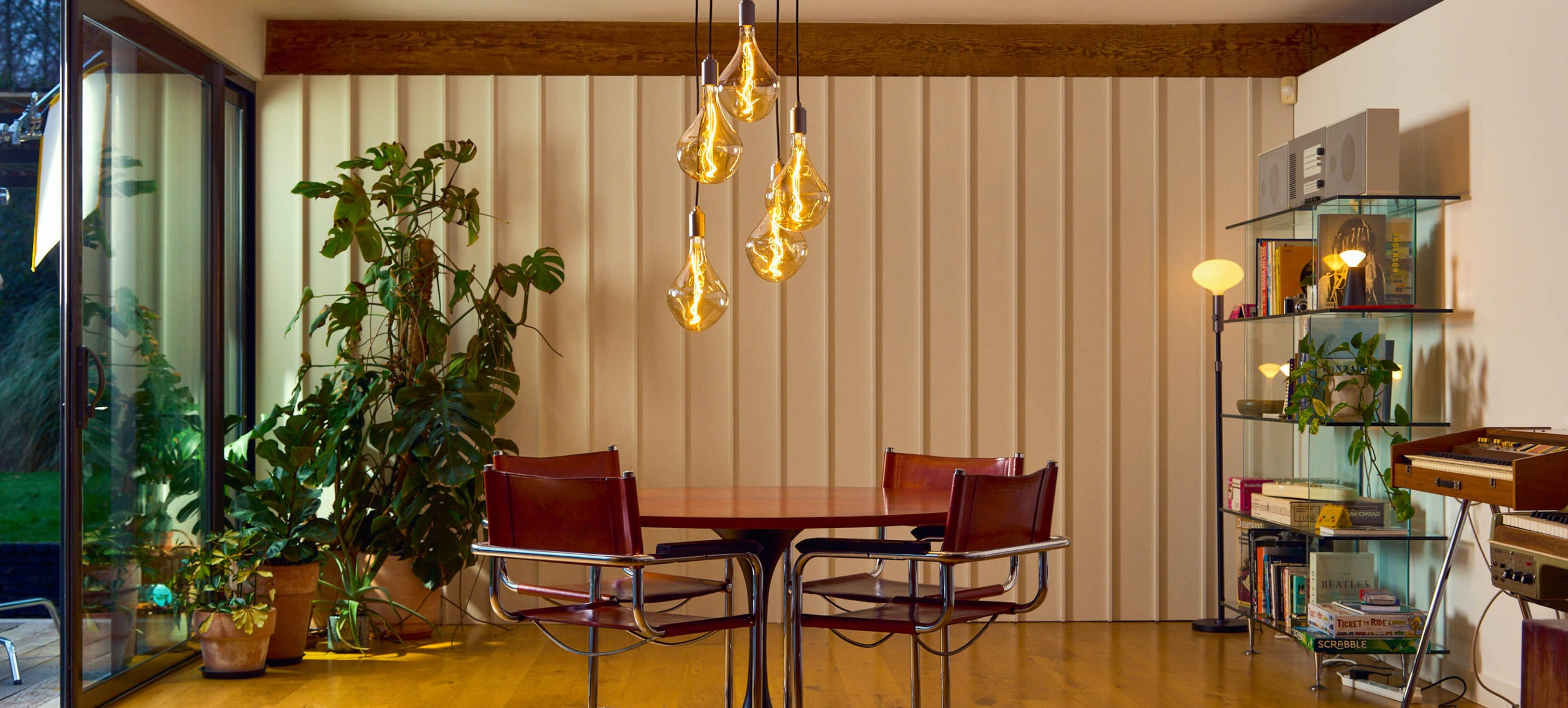 A close-up of Tala Lighting's designer glass light bulbs with visible filaments.