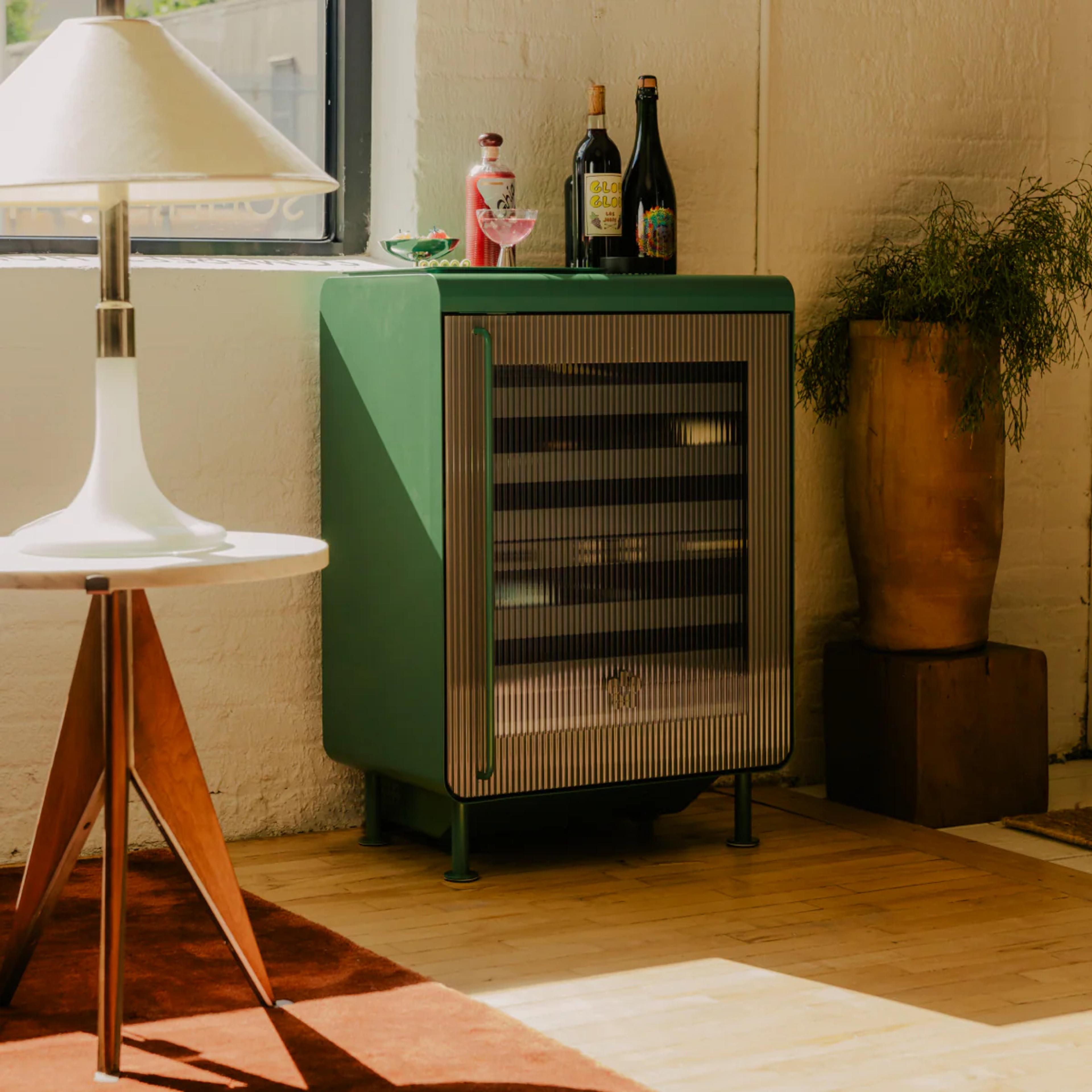 A modern Rocco smart beverage fridge integrated into home decor.