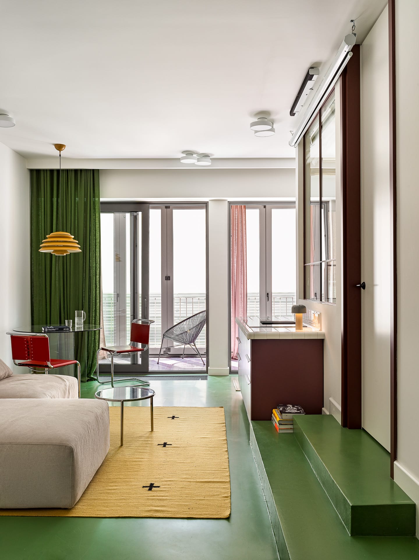 Multi-functional furniture including a compact table and storage-integrated seating.