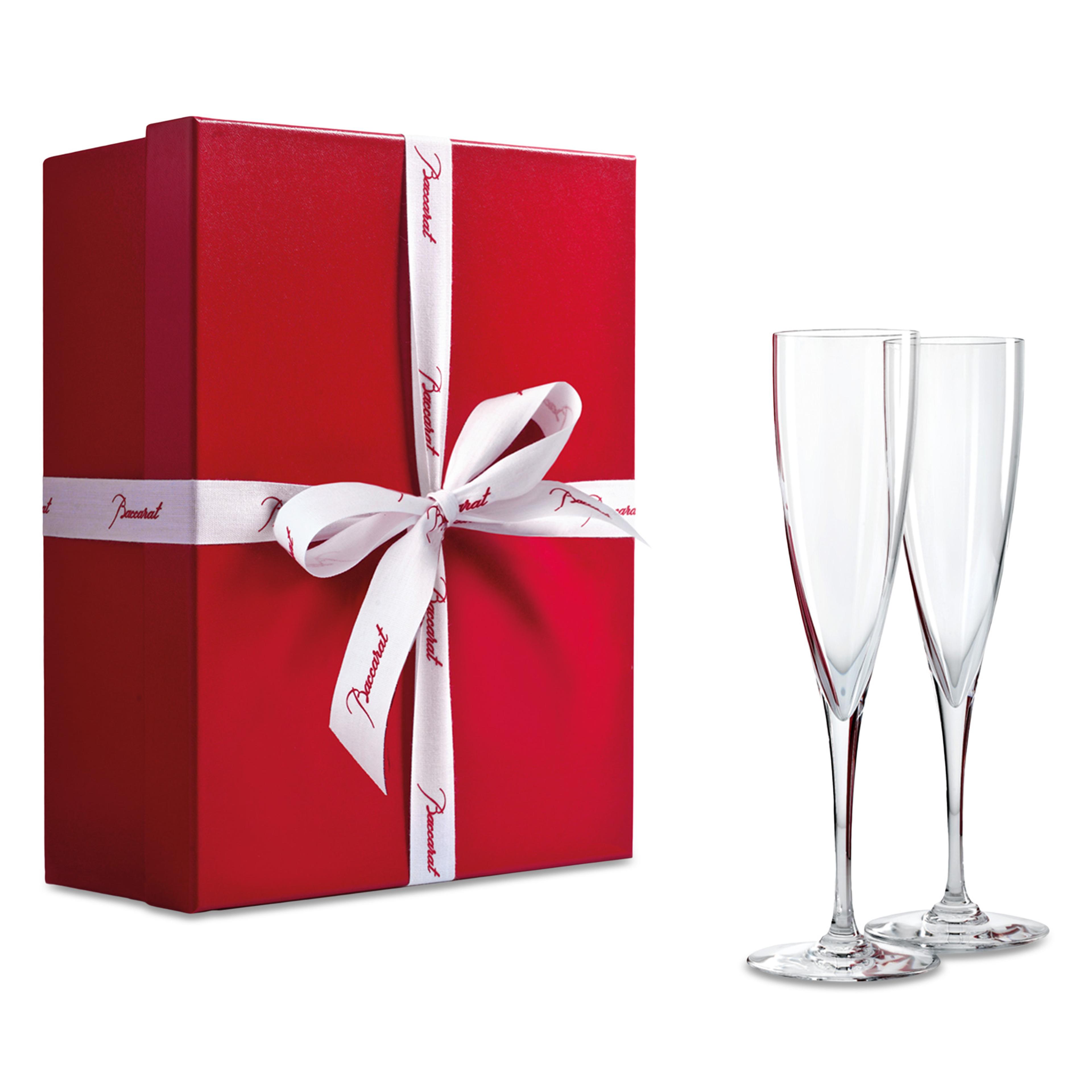 A pair of elegant Baccarat Dom Pérignon champagne flutes.