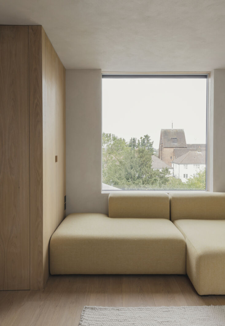 A bright loft conversion used as a yoga studio with integrated ventilation.