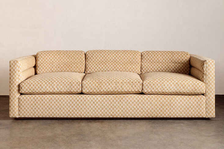 Kelly Wearstler Melrose Sofa featuring a neutral checkered fabric in a bright living room.