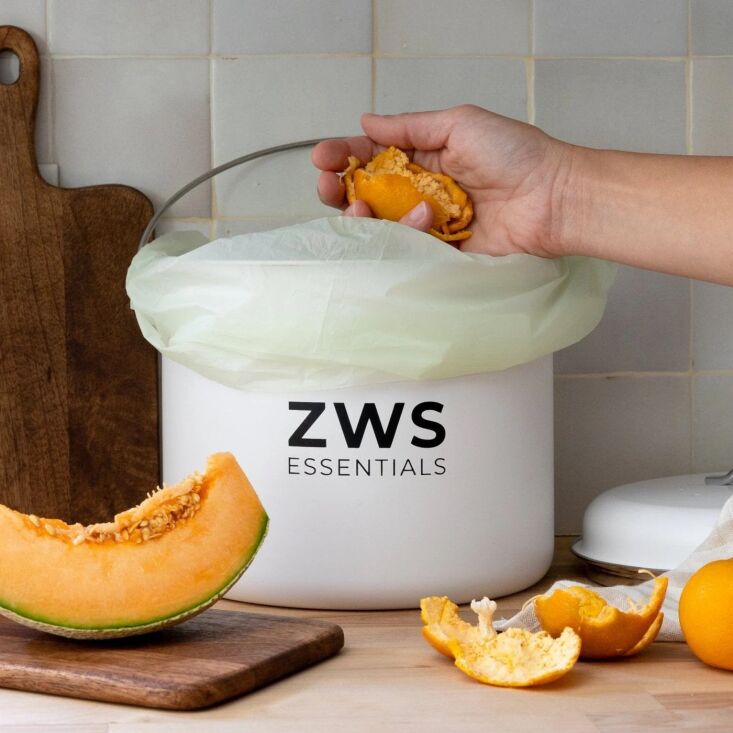 A clean, off-white countertop compost bin from the Zero Waste Store.