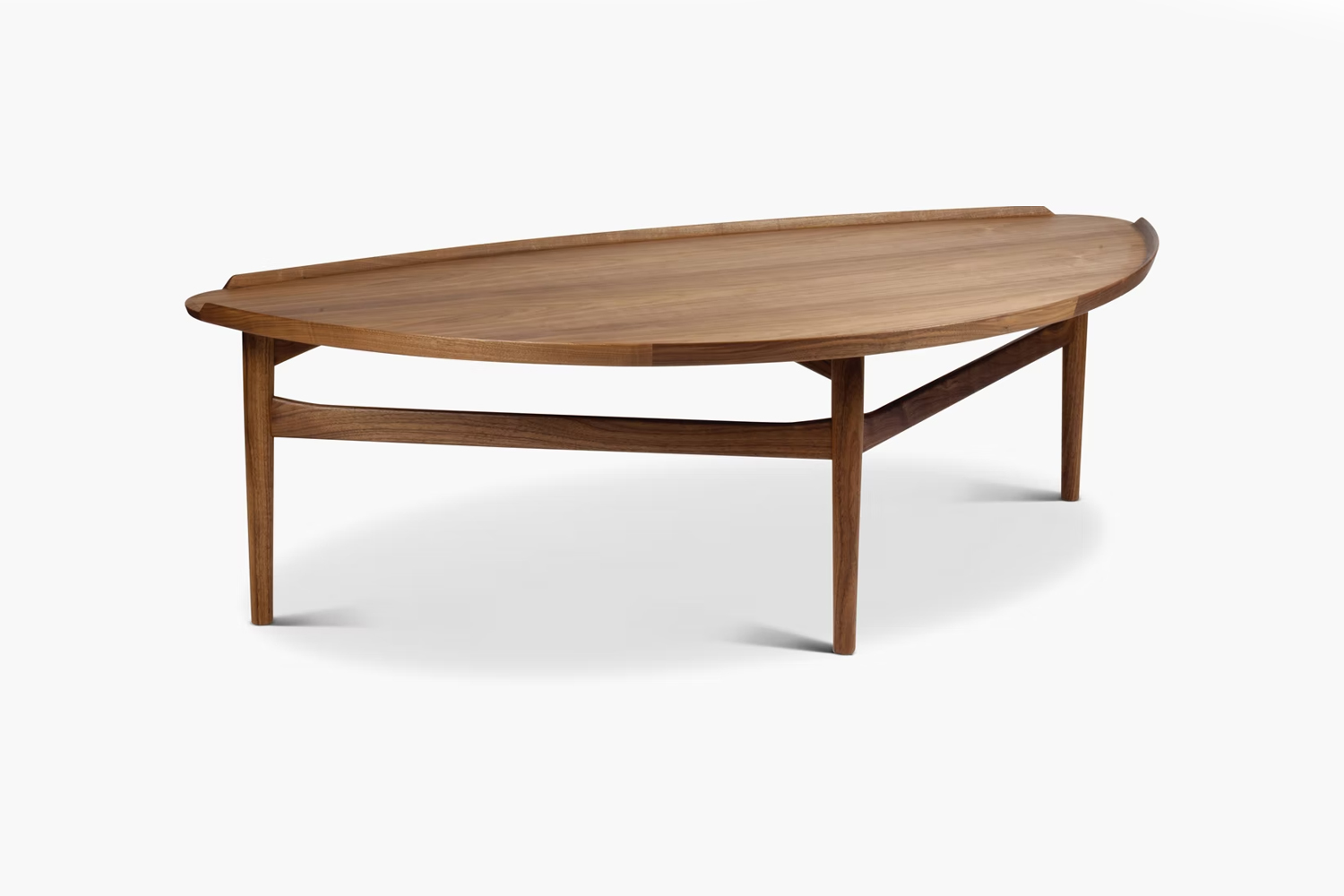 A midcentury modern Finn Juhl Cocktail Table in rich walnut wood.