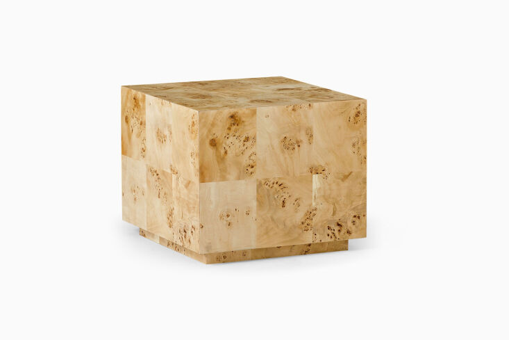 A square side table featuring a graphic patchwork pattern of burl wood veneer.