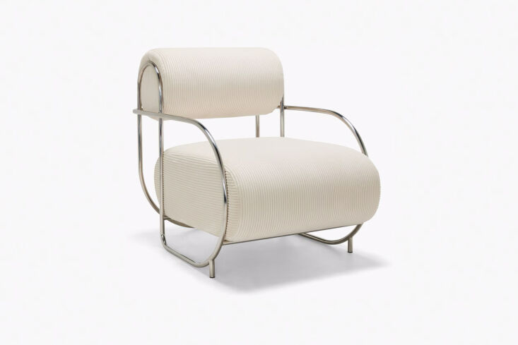 The Ellison Studios Chromeo Chair in brown Sorrento Corduroy with a matching ottoman.