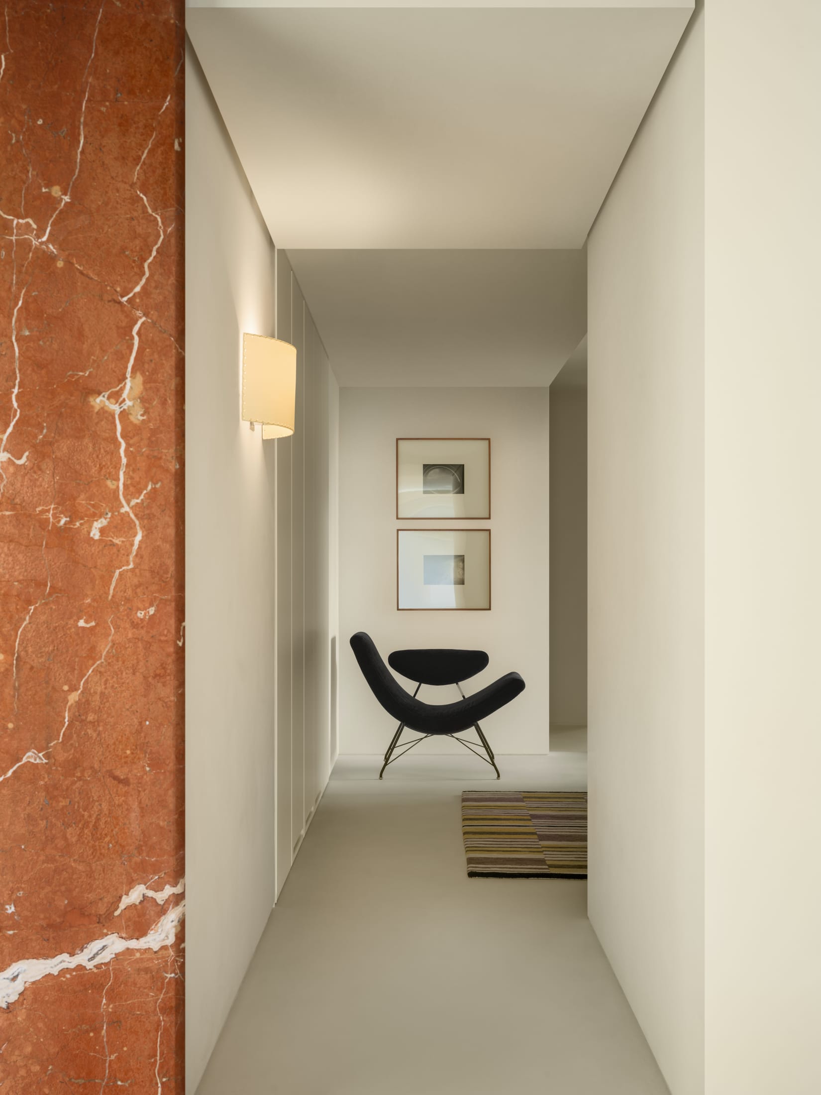 Indoor plants and ferns meticulously integrated into custom timber shelving and joinery.