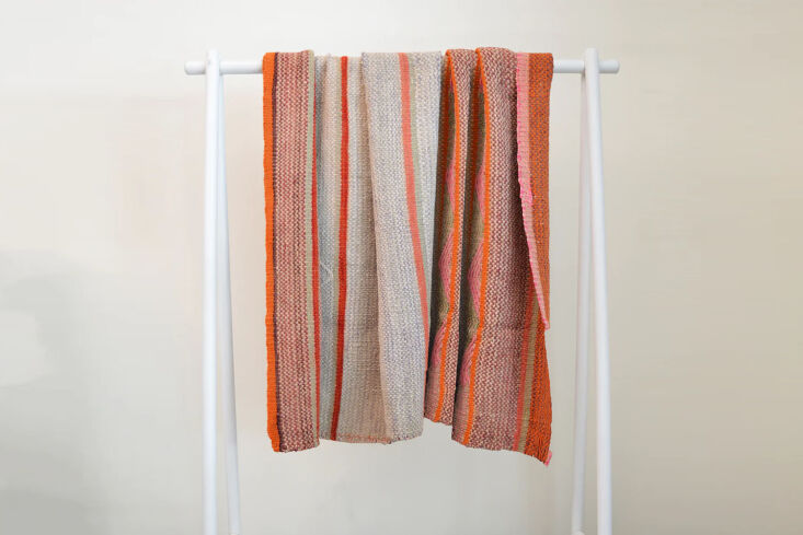 A vintage Peruvian rug with colorful woven patterns.