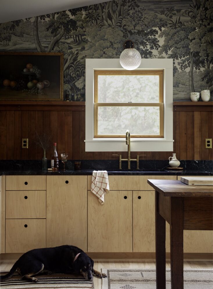 Clean-lined modern maple veneer cabinets paired with traditional kitchen elements.