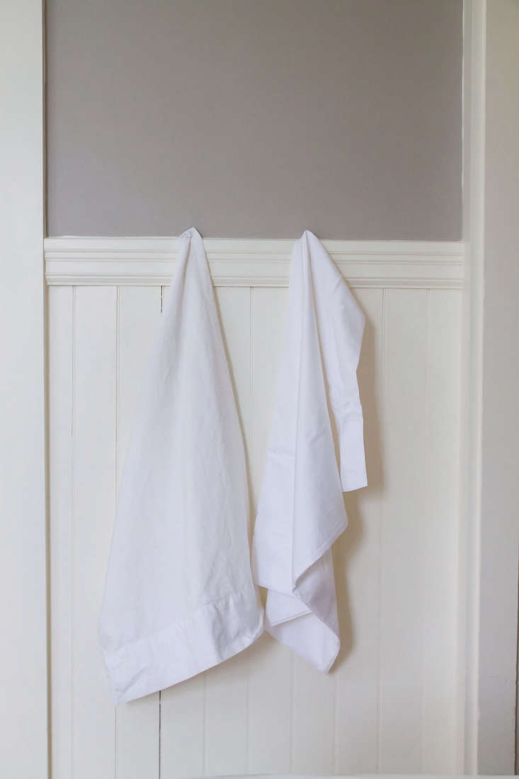 Close-up of a crisp, bright white pillowcase after several washes with bluing.