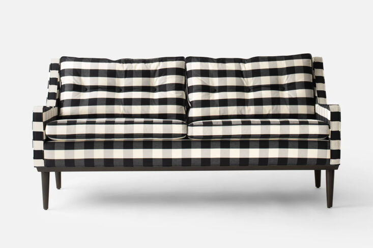 The Jack Sofa from Schoolhouse featuring a black-and-white windowpane plaid pattern.