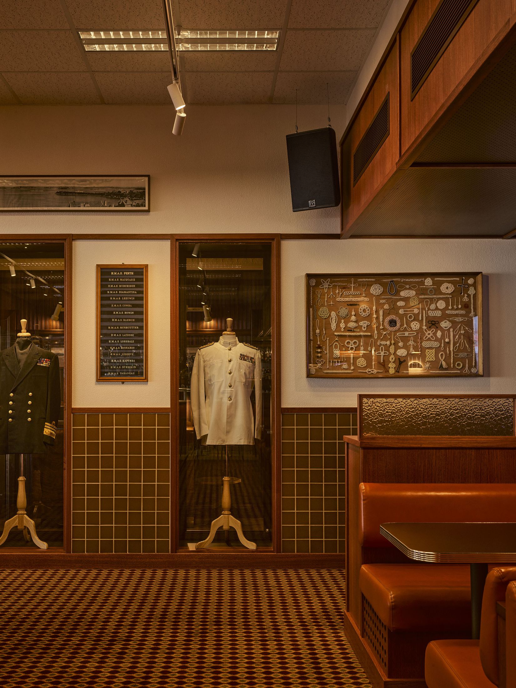 The amber-tinted hammered glass and plush banquettes of Mr Pop record bar.