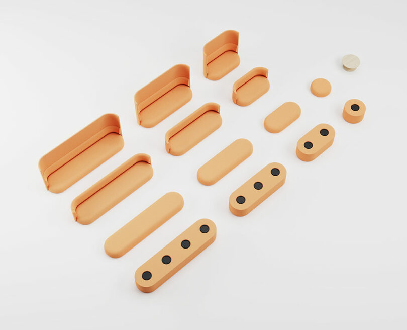 Geometric orange furniture components and circular pads arranged in a grid.