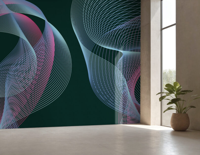 A minimalist room with a dark wall featuring abstract, colorful curved lines behind a potted plant.