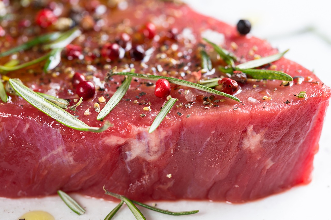 Multiple portions of raw beef professionally vacuum sealed for bulk storage