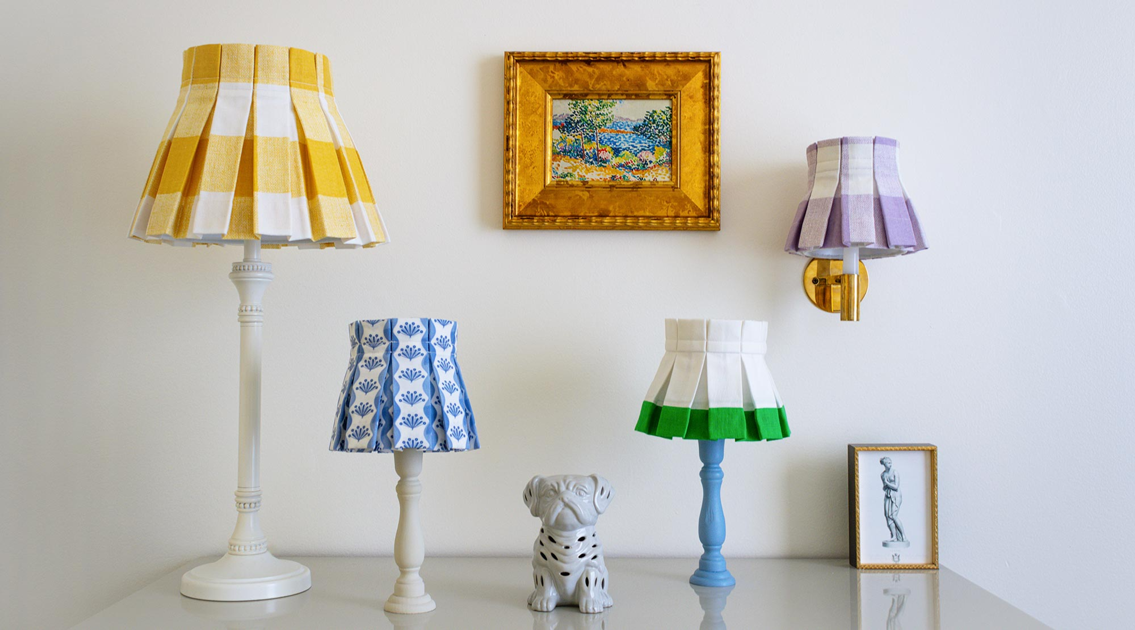 Patterned fabric lampshades with intricate designs for table lamps.