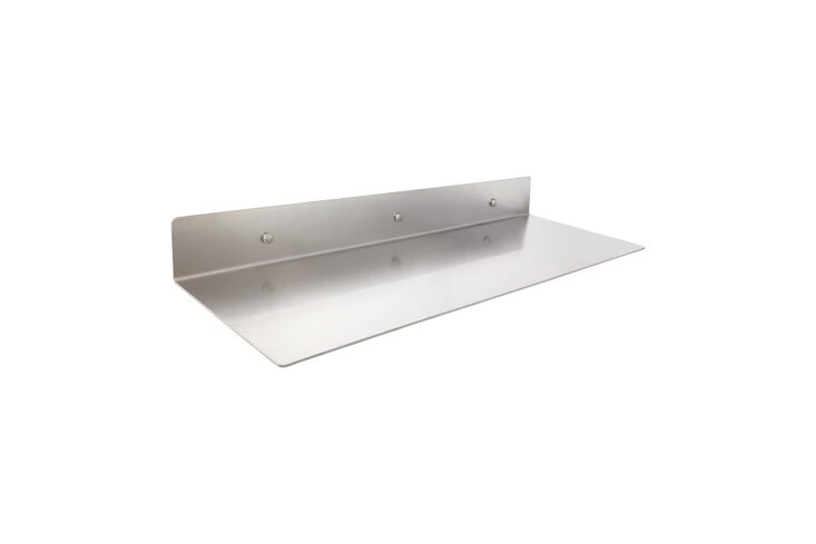 Brushed nickel stainless steel floating shelf installed in a kitchen.