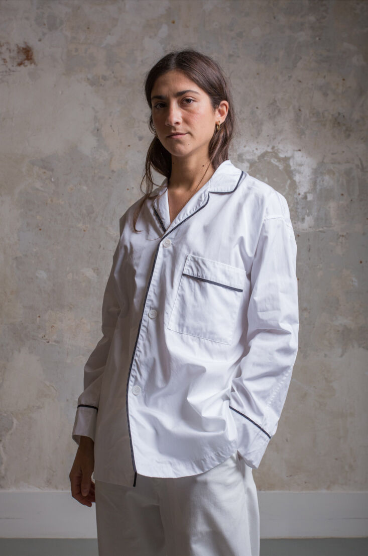 Luxury cotton pajama tops and bottoms in olive and white with contrasting dark blue piping.