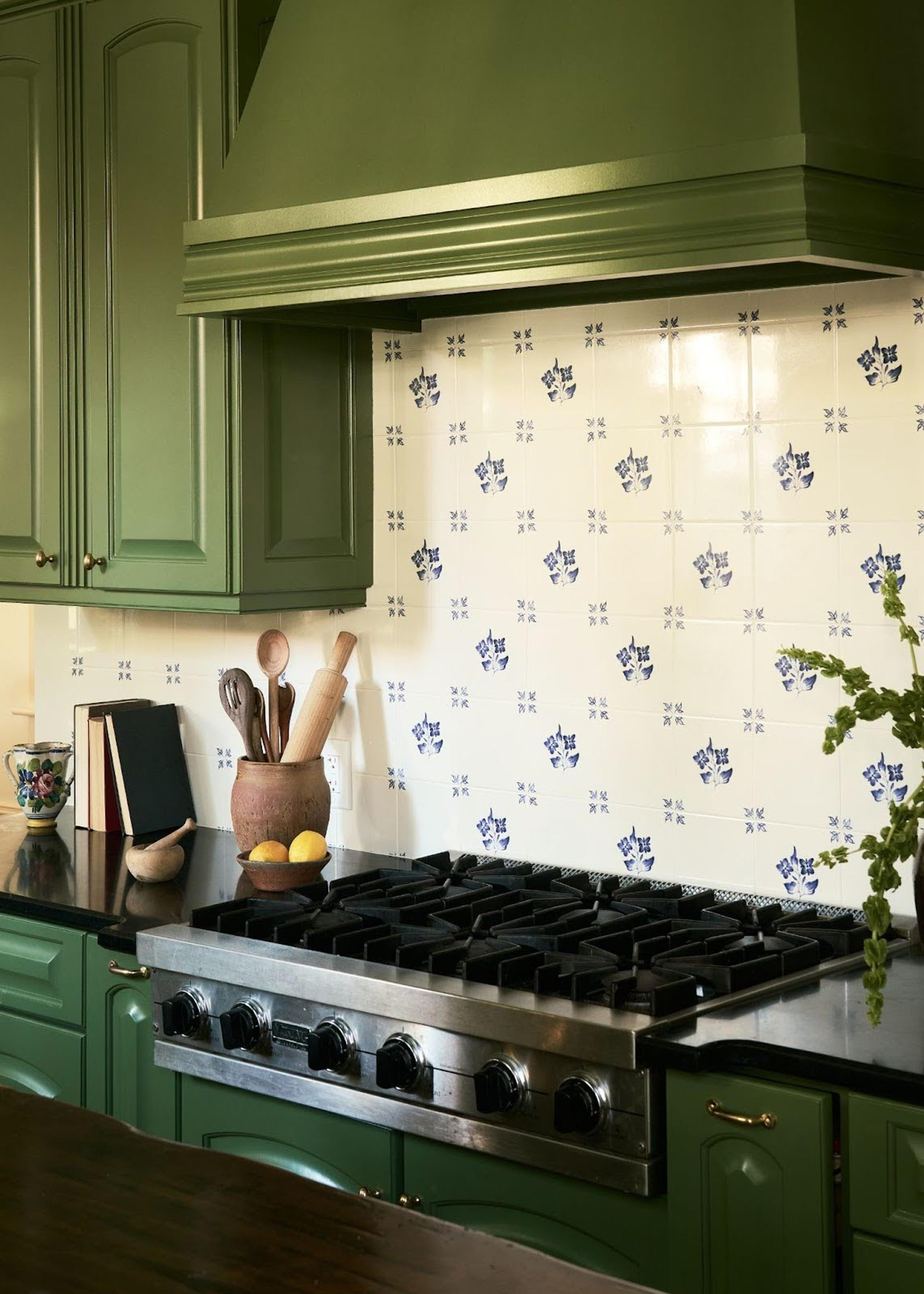 A clean, modern kitchen range area featuring a high-end finish.