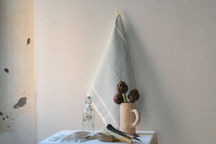 The Kali Tea Towel in Acquamarina blue, inspired by vintage French textiles.