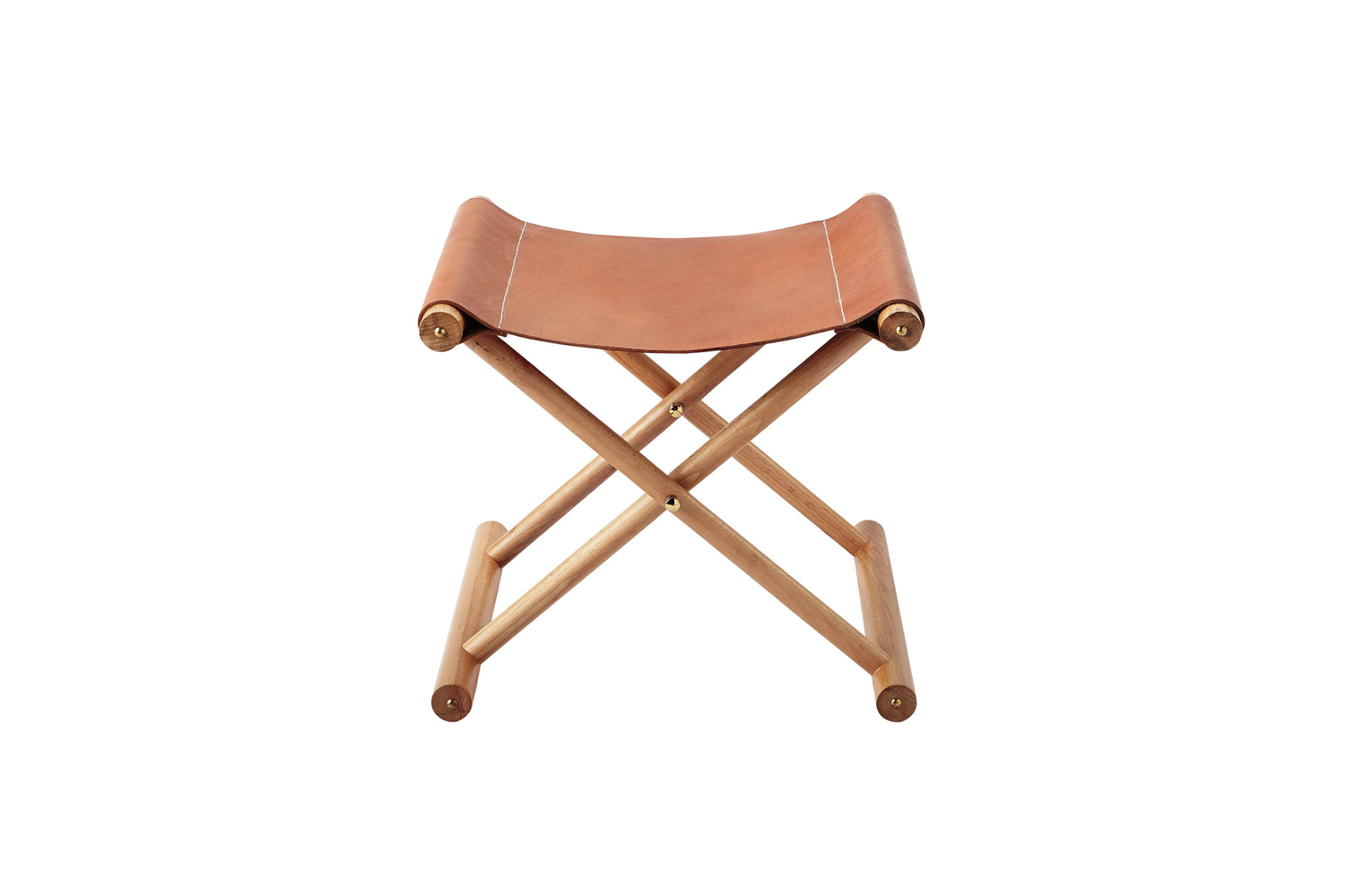 Leather and wood X-base camp stool used as a luggage stand.