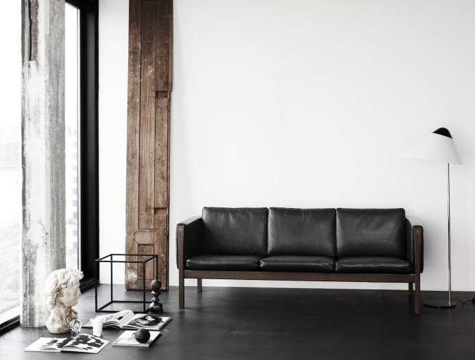 A minimalist graphic layout featuring various modern leather sofa designs.
