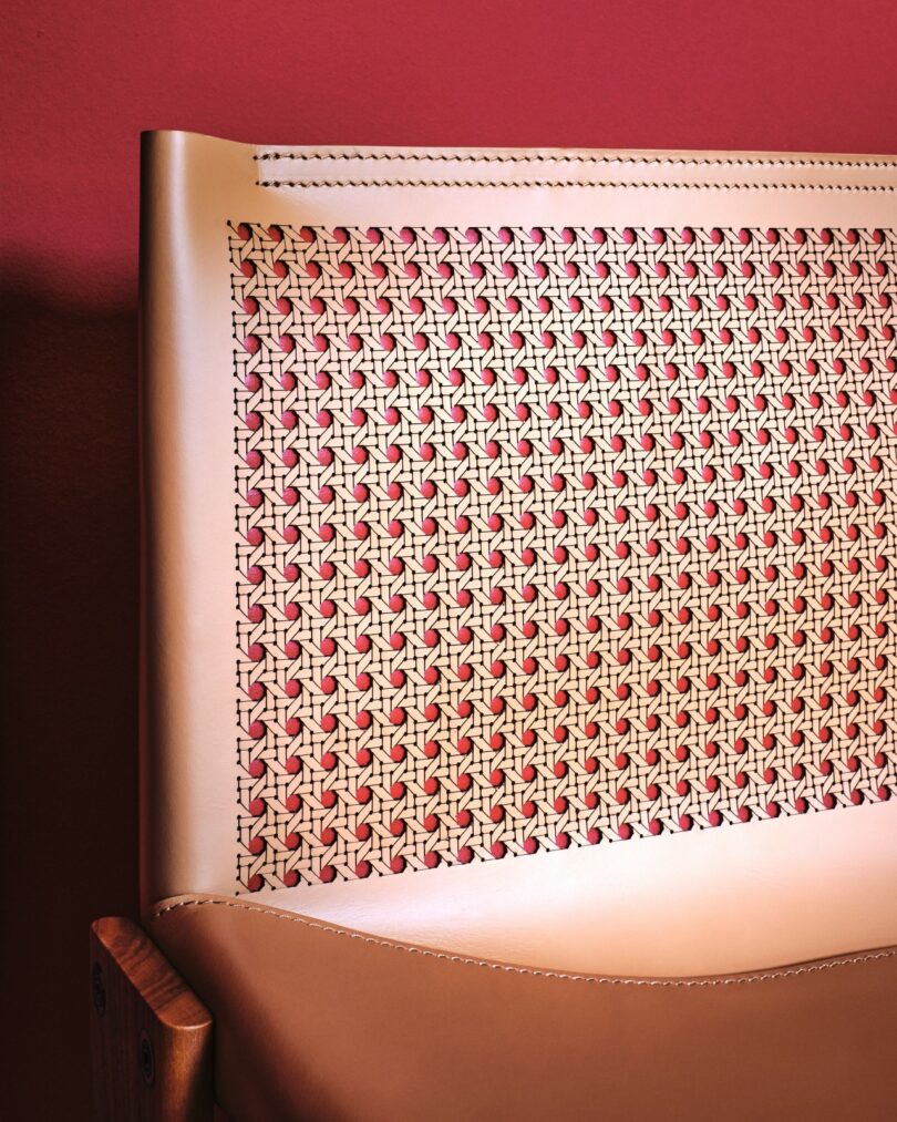 Close-up of laser-engraved tan leather with a pattern resembling woven cane.