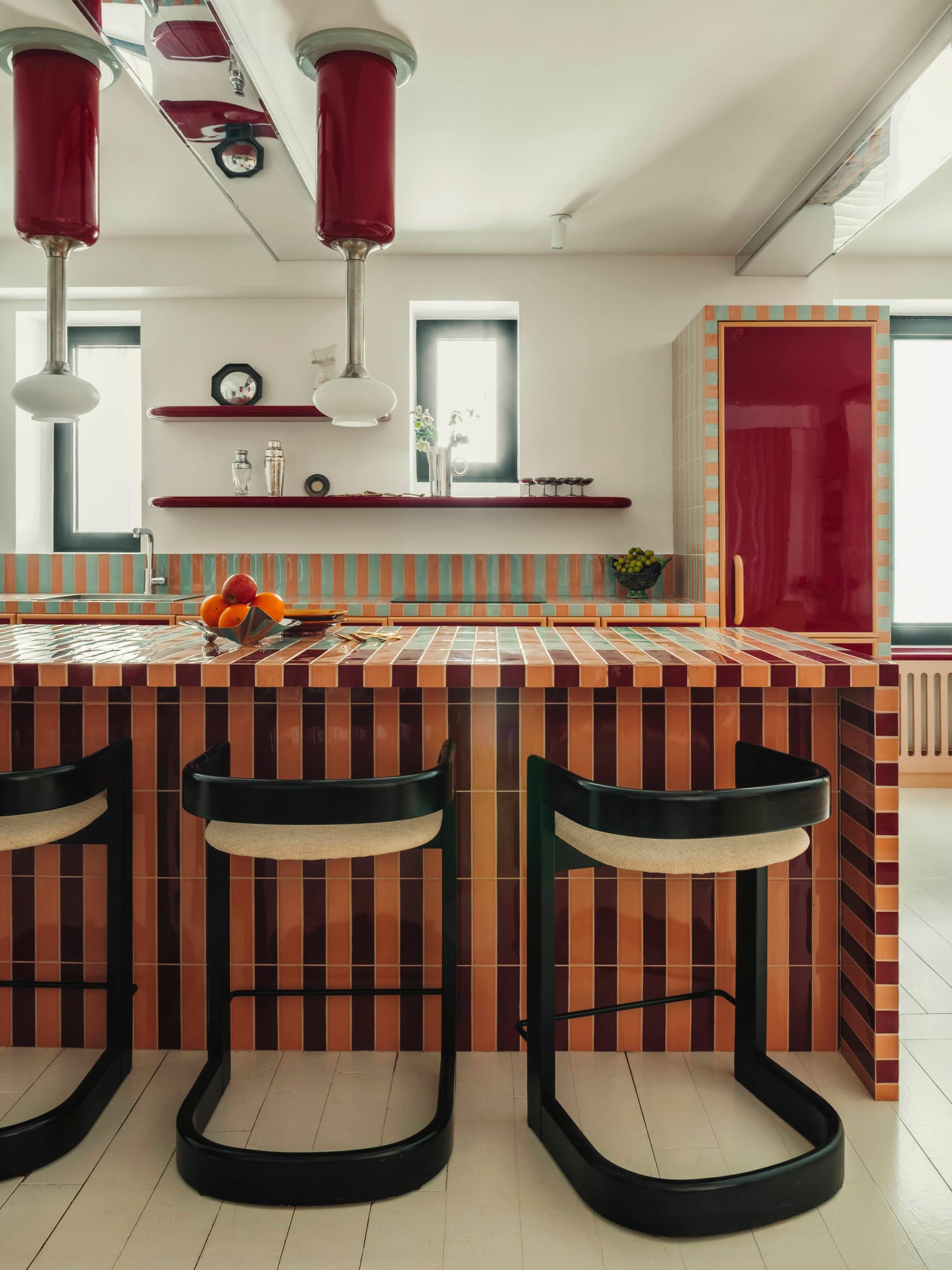 A close-up of zellige tiles and vintage 20th-century furniture details.