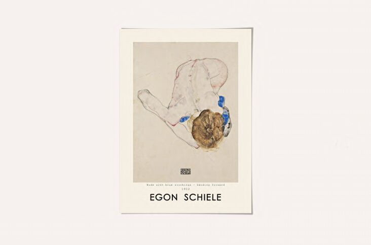 A framed poster of Egon Schiele's Woman with Blue Stockings.