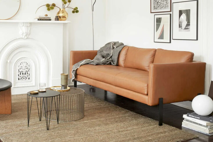 The Truss Apartment Sofa from TRNK in a minimalist living room setting.