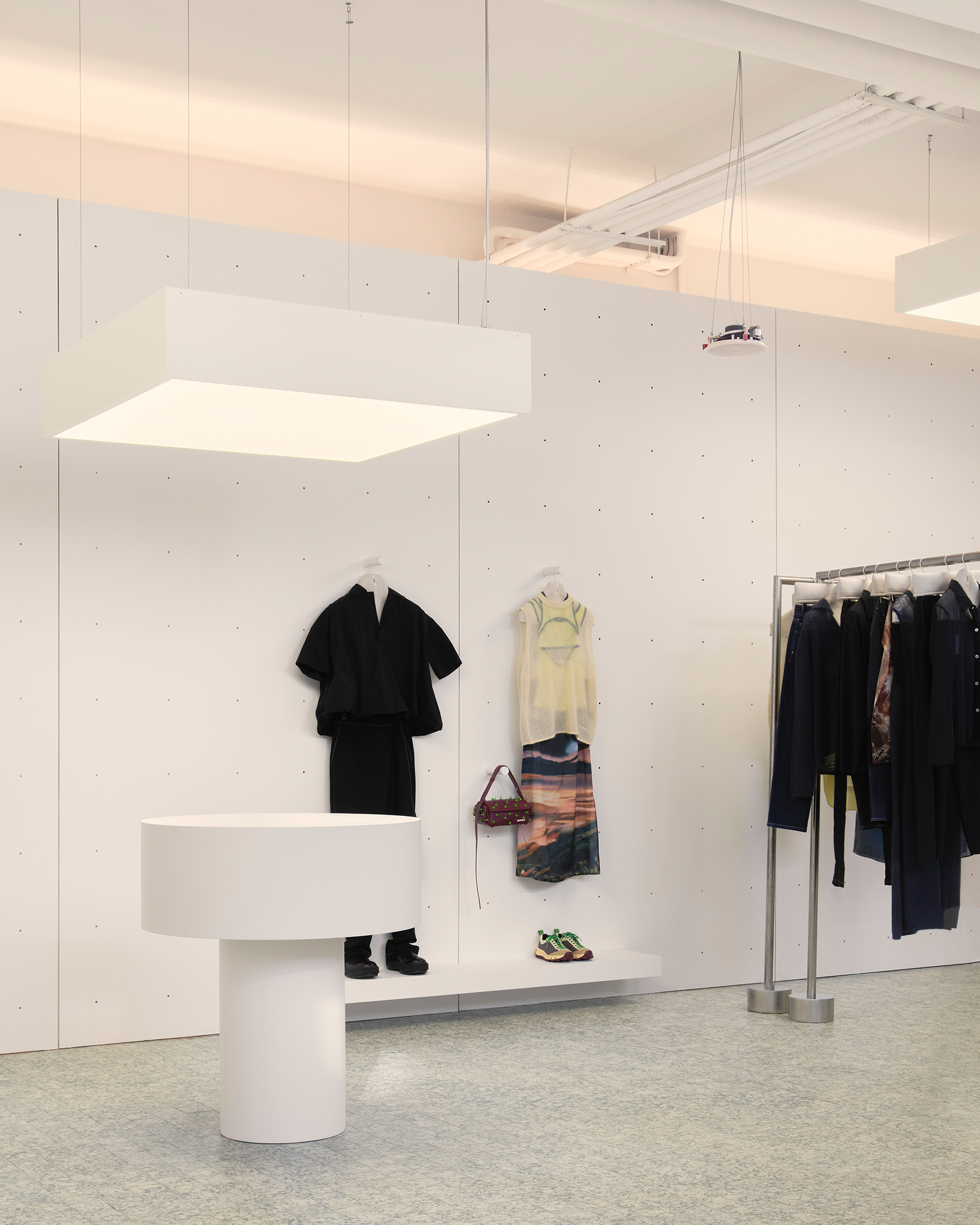 View of the hybrid retail and gallery space within the Sunnei flagship.