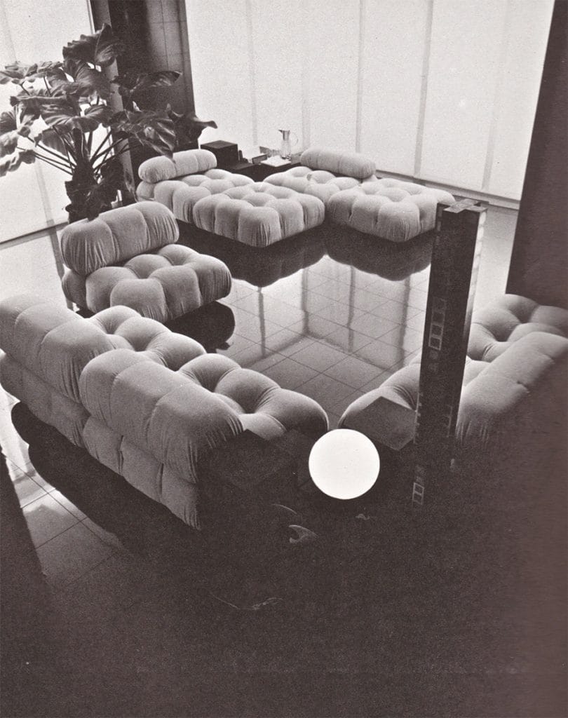 A vintage-style archival photograph of the original Camaleonda sofa in a classic interior.