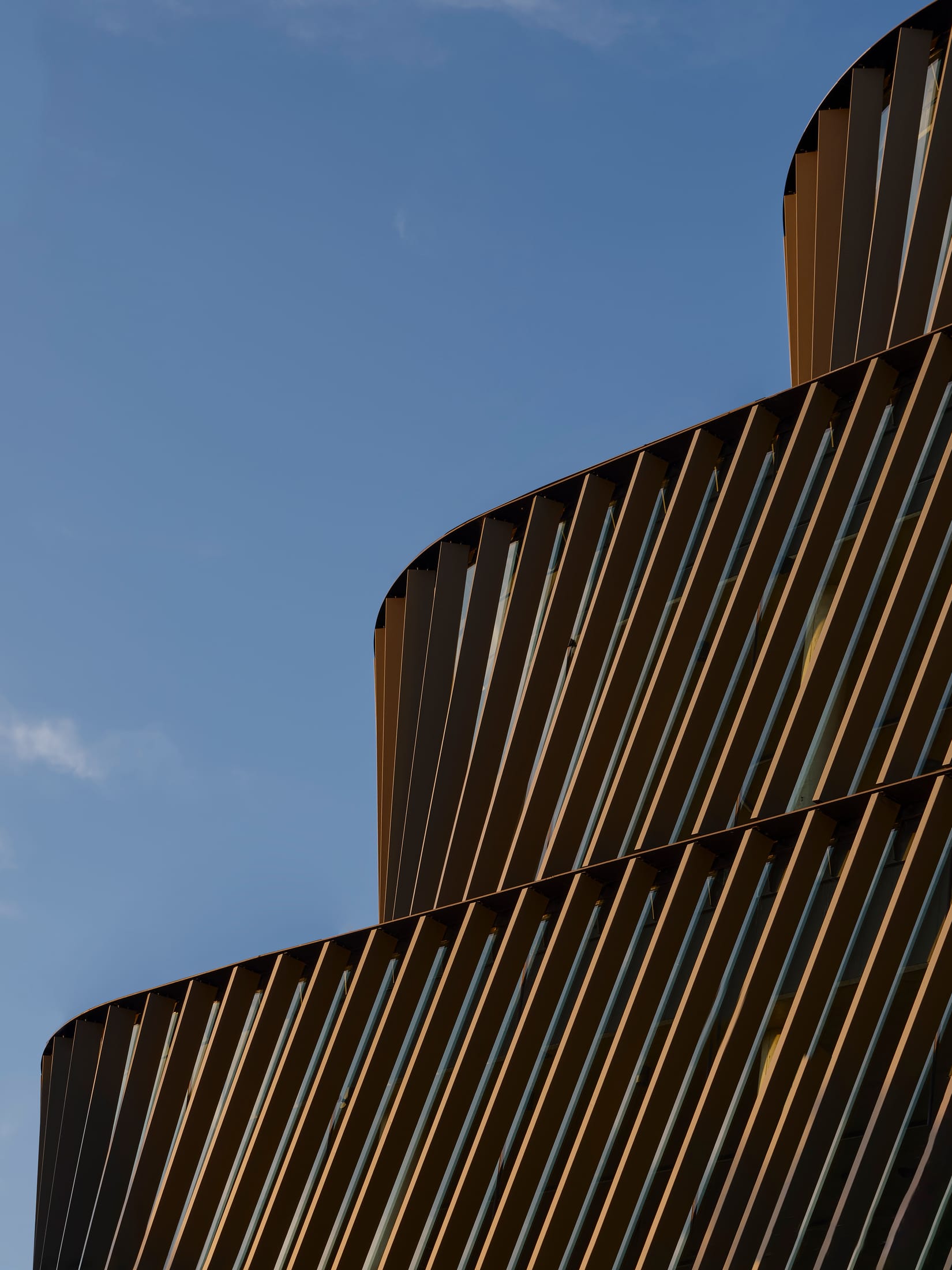 Wide shot of the Bundarra building facade from the street corner showing the five-storey structure.
