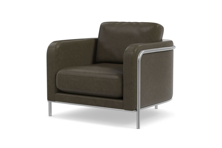 The West Elm Nina Leather Chair with a curved polished stainless steel frame and leather seat.