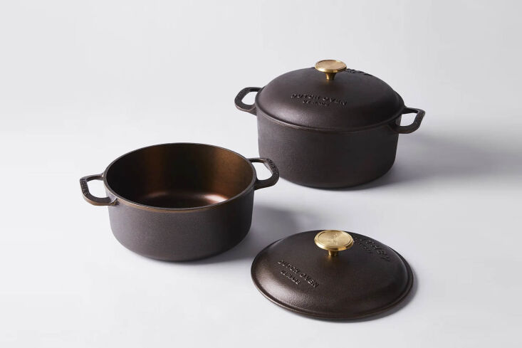 A polished interior Smithey Ironware Cast Iron Dutch Oven.