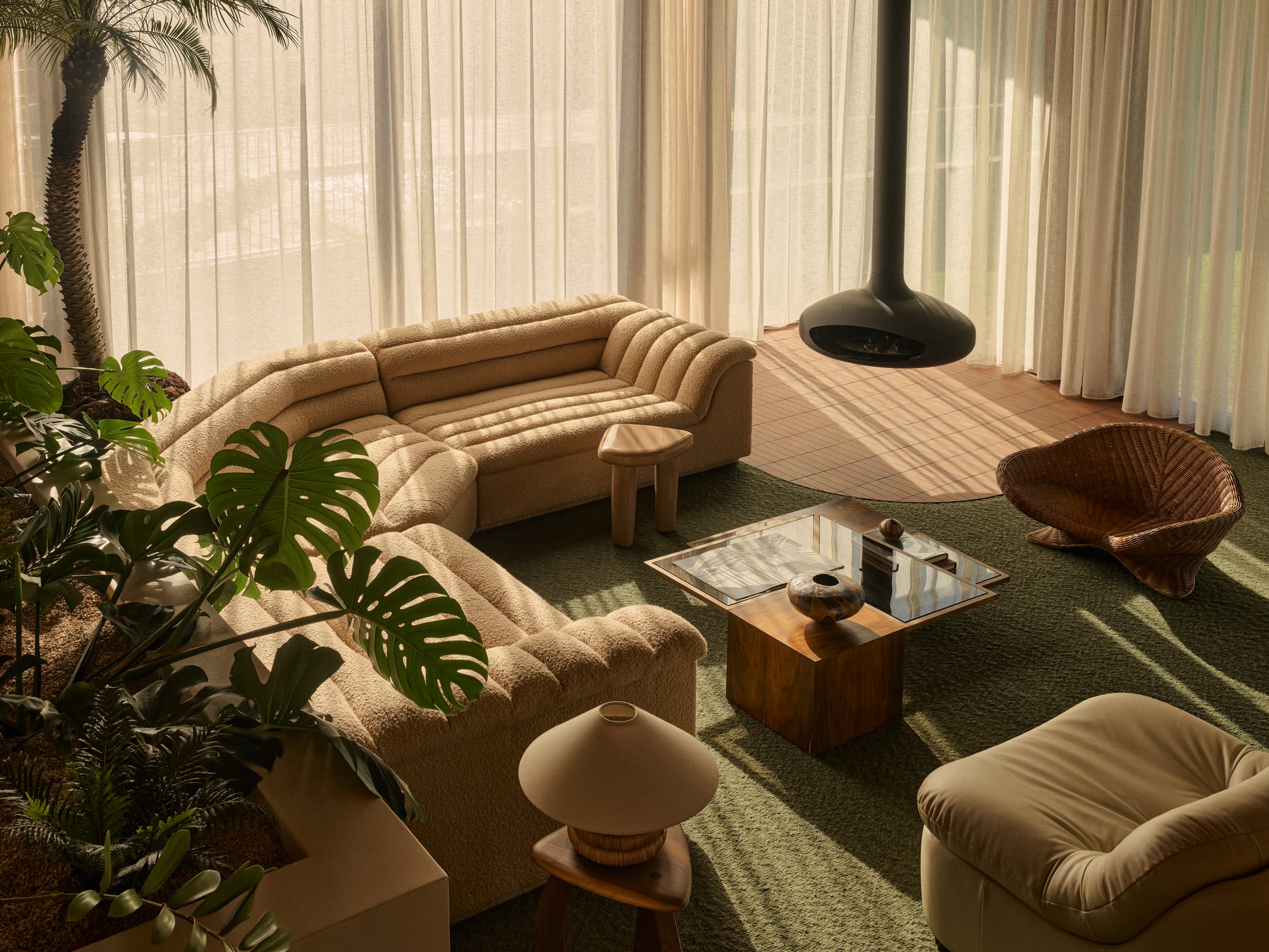 View from the interior looking out towards the lush tropical garden and landscape.