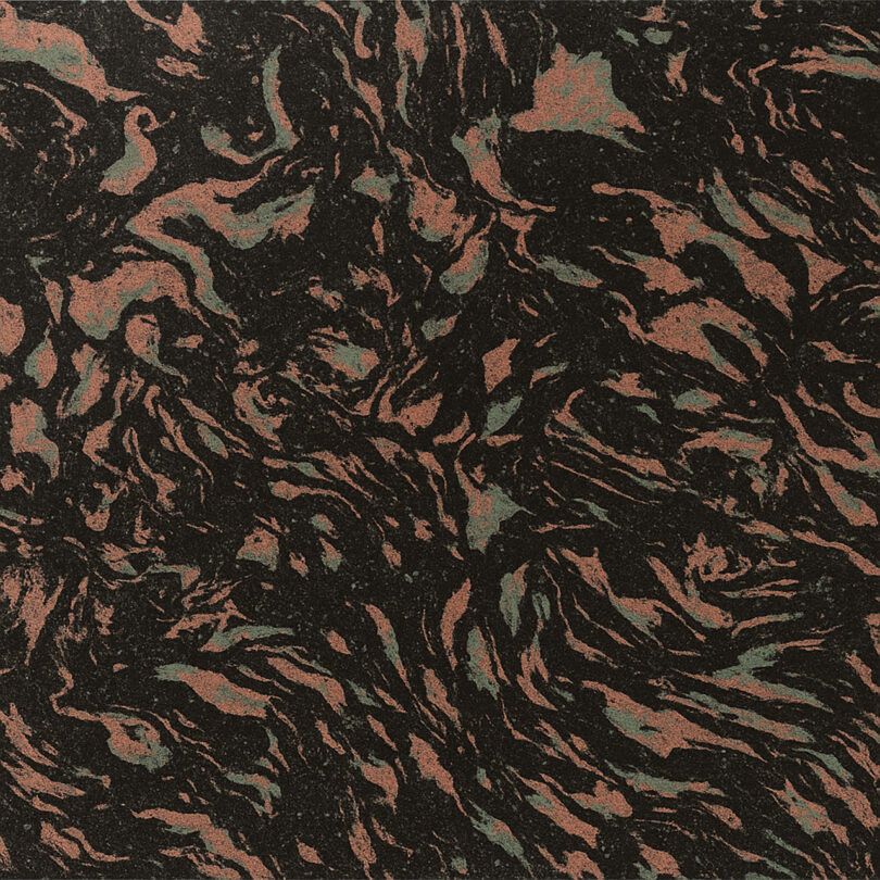 Abstract marbled texture with swirling patterns of black, green, and brown.
