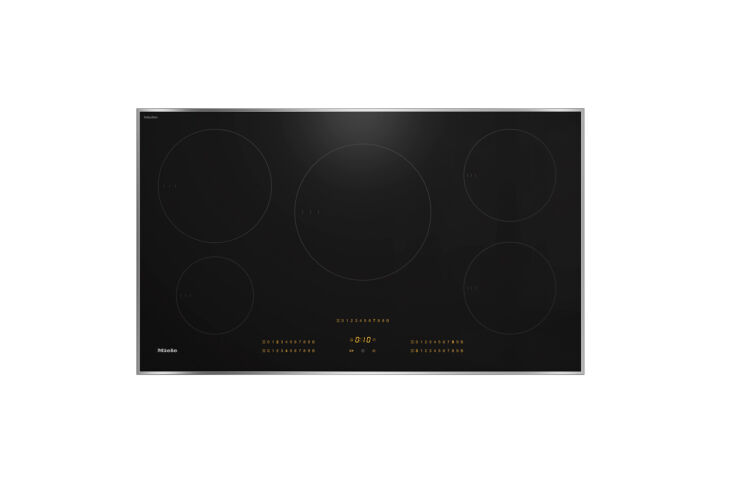 Miele induction cooktop showing the sleek ceramic glass and intuitive control panel.