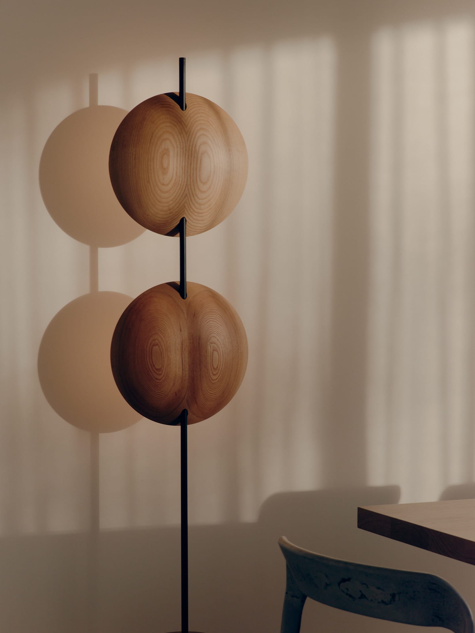 A detailed shot of a lighting fixture or furniture piece emphasizing texture and natural material.