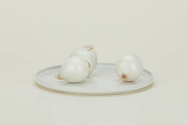 Bone-colored round Hawkins New York Essential Serving Platter.