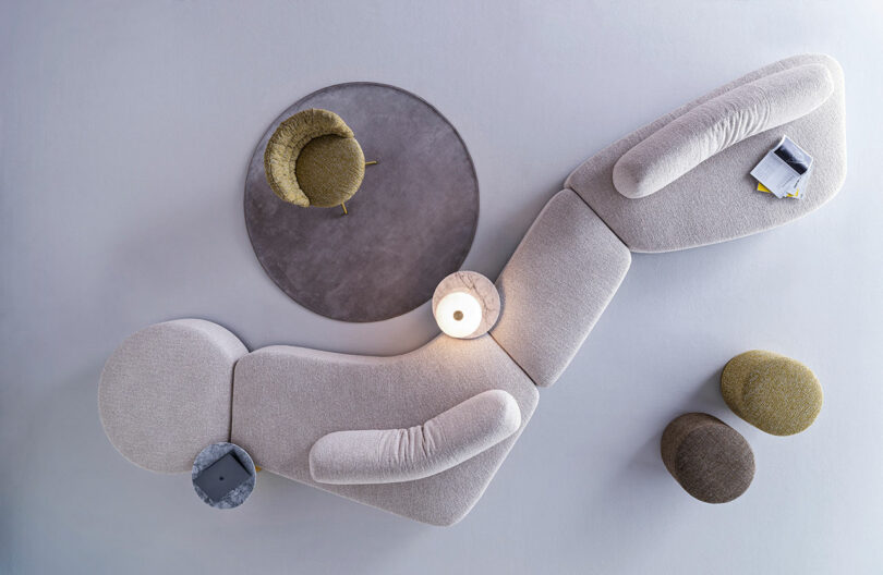 Top-down view of modular furniture components arranged in a creative, non-geometric layout.