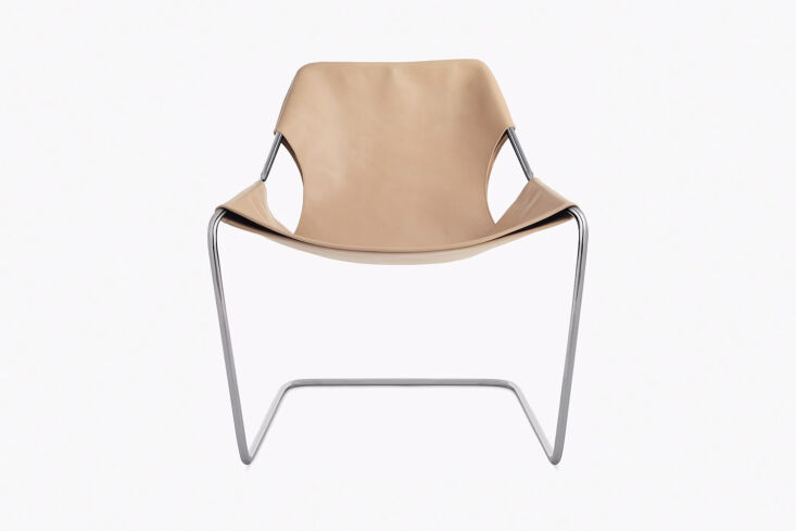 The Paulistano Armchair featuring a single 17-foot-long piece of solid steel and a black sling seat.