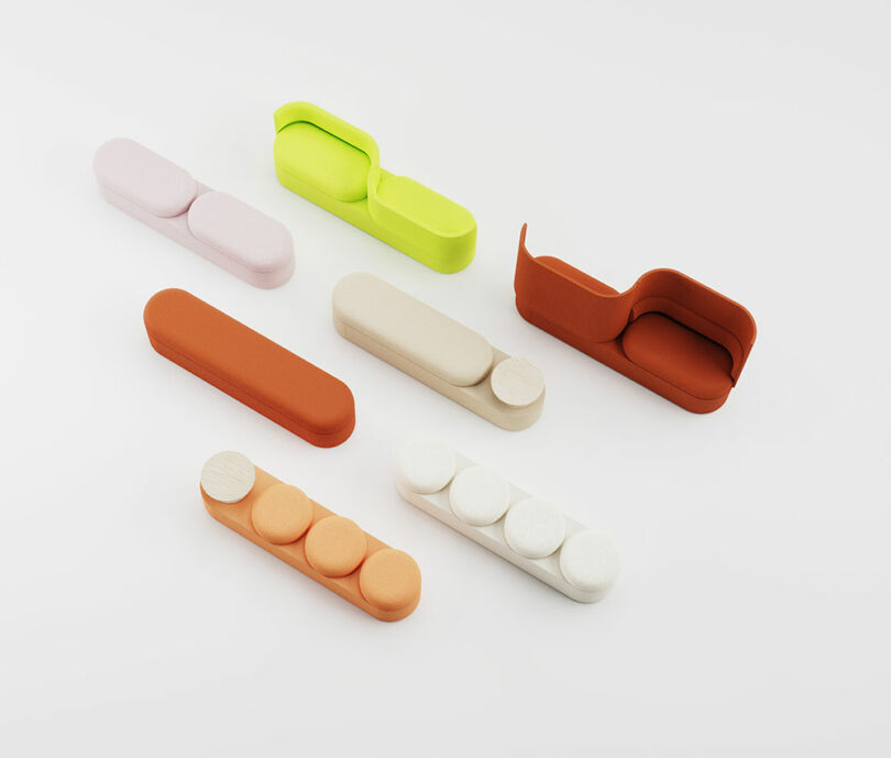 An array of seven different colorful modular sofa models showing various shapes and seating configurations.