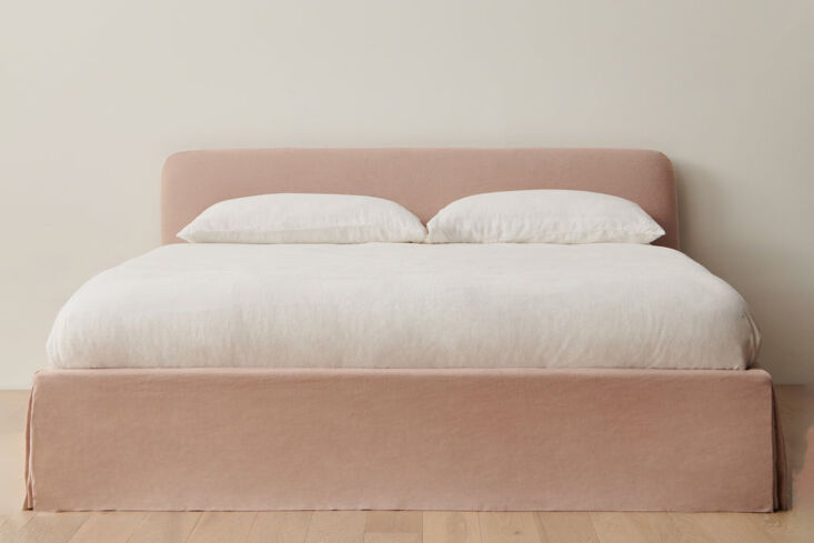 A modern upholstered bed frame in shell linen texture.