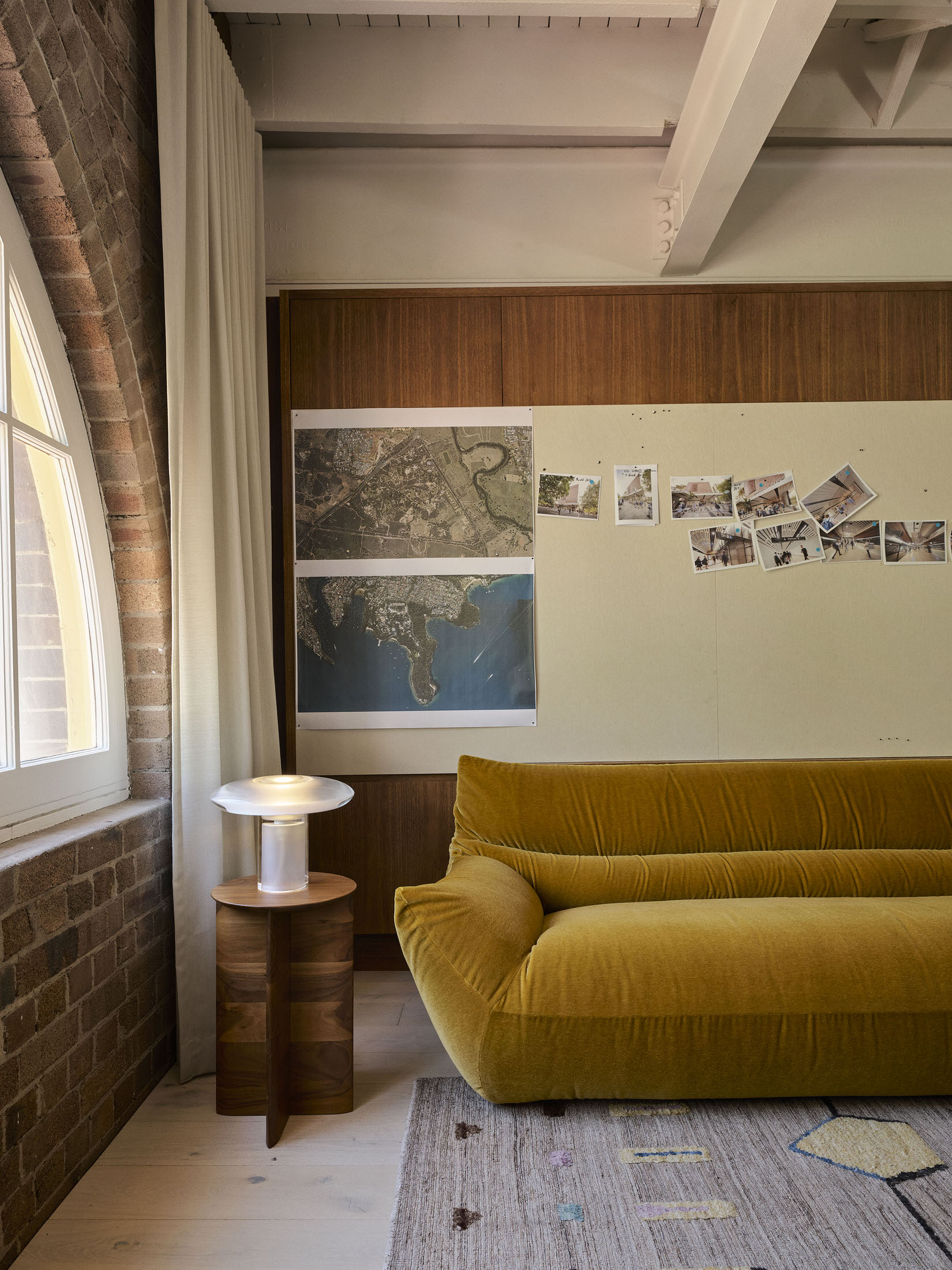 Billo sofa paired with Nola table light and Nami side table in a curated interior setting.