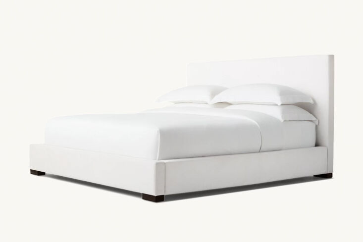The RH Modena Fabric Panel Bed featuring a clean, modern design and integrated side drawers.